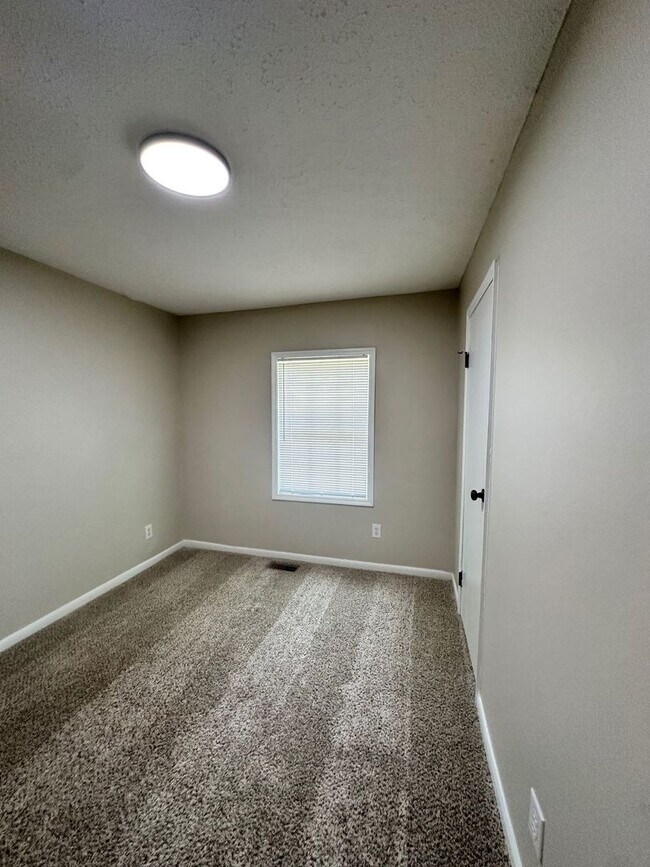 Building Photo - Pet-Friendly 2-Bedroom Home with Deck