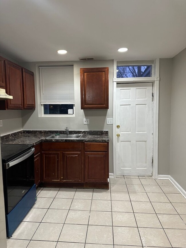 Building Photo - Spacious, Newly Renovated Home! Central Air! Finished Basement! W/D! Double Level Rear Deck! Avai...