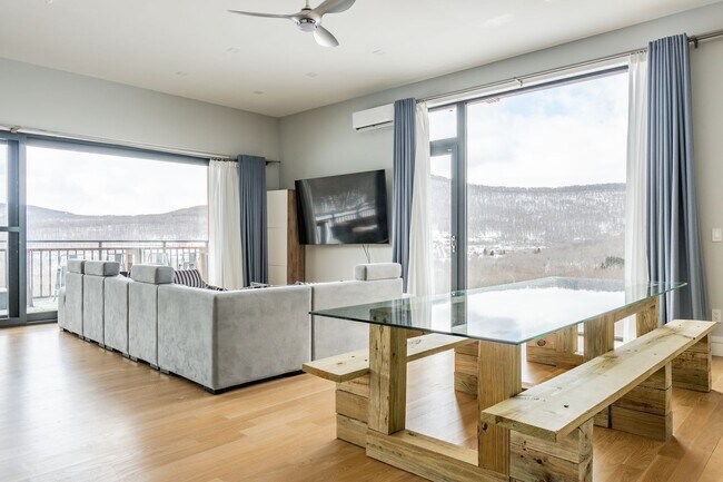 Building Photo - Modern Mountain Retreat with Rooftop Hot T...