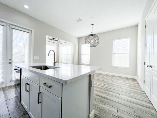 Building Photo - Luxury 4-Bedroom Townhome in Laureate Park – Now Available!
