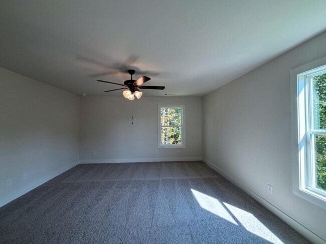 Building Photo - 4420 Whitetail Path Cove