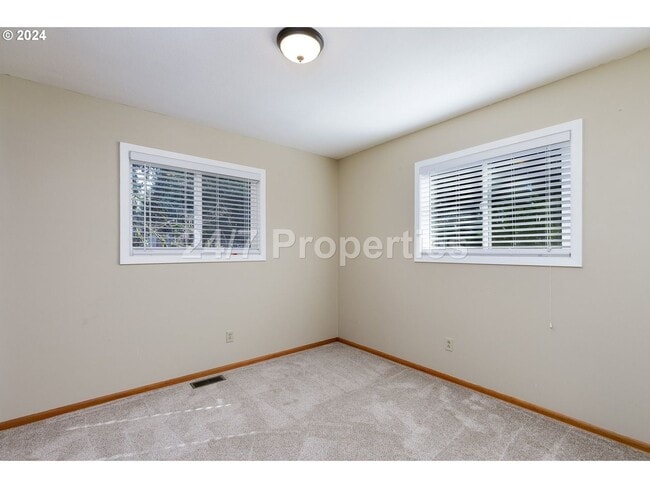 Building Photo - *1/2 OFF FIRST MONTHS RENT* Spacious 4BD I...