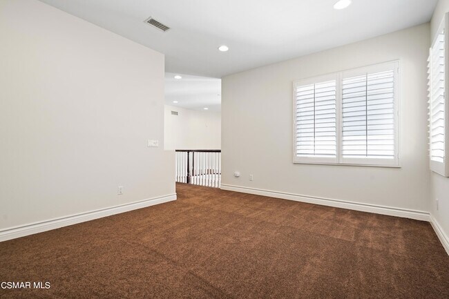 Building Photo - 6077 Mandeville Pl