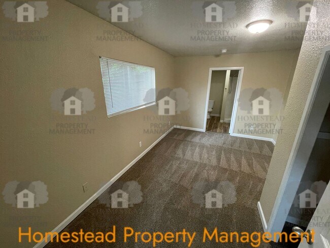 Building Photo - 219-219 1/2 S Monmouth Ave