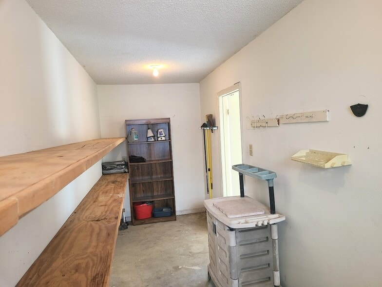 Garage storage room expands the length of the garage - 12439 Coursey Blvd