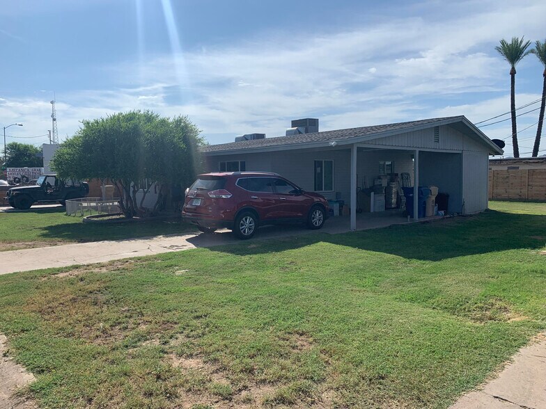 Private drive-covered carport - 1009 E Watkins St