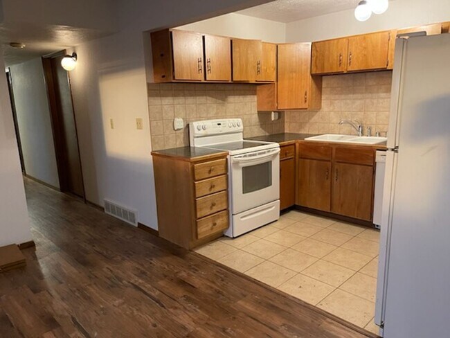 Building Photo - Waterfront! Sunset views! 3 bdrms! Attached garage! Private driveway!