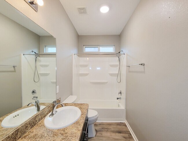 Building Photo - Welcome to this charming one-story home fe...
