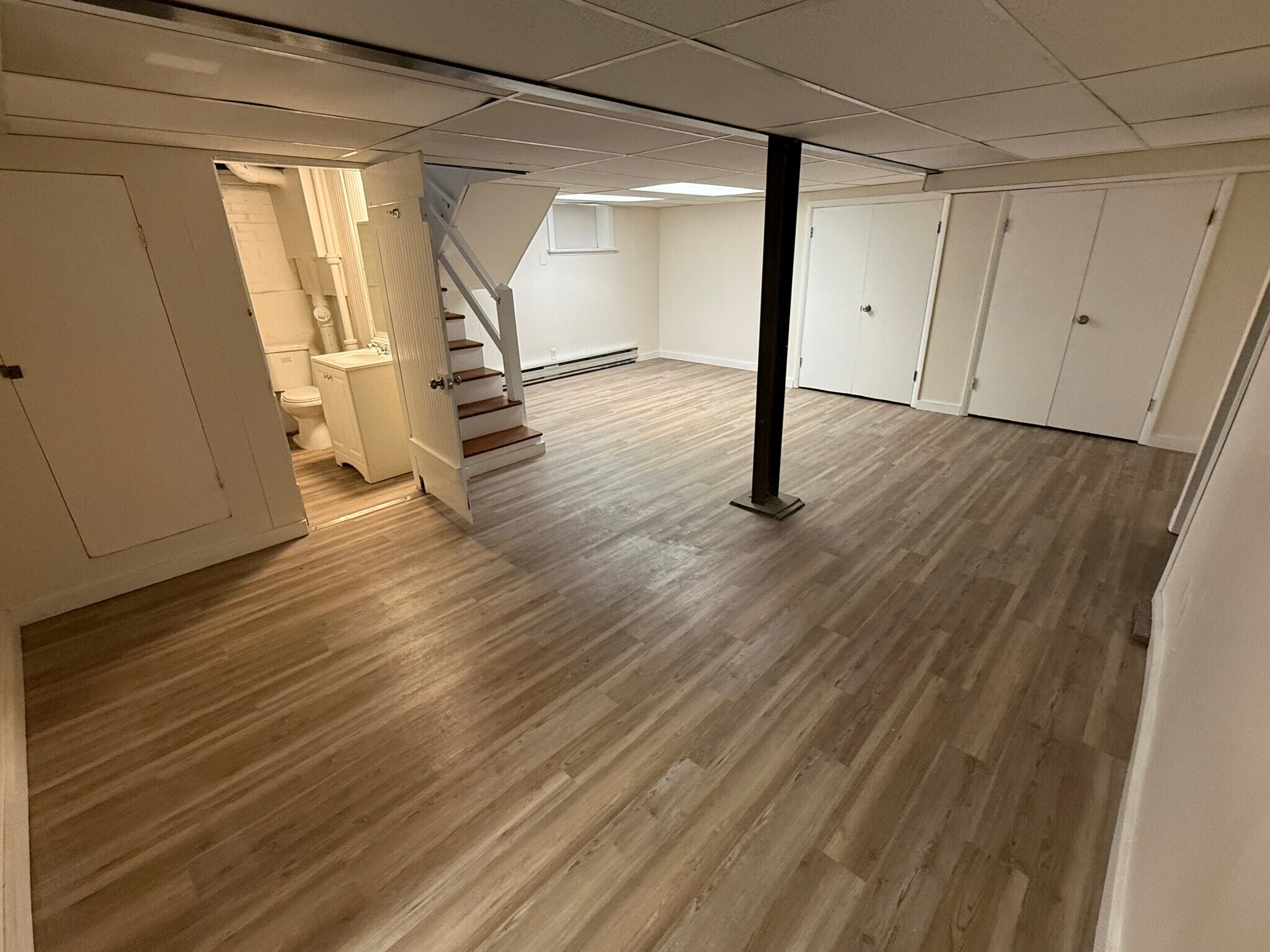 Finished basement with all new flooring and ceiling. - 3068 Bellerive Dr