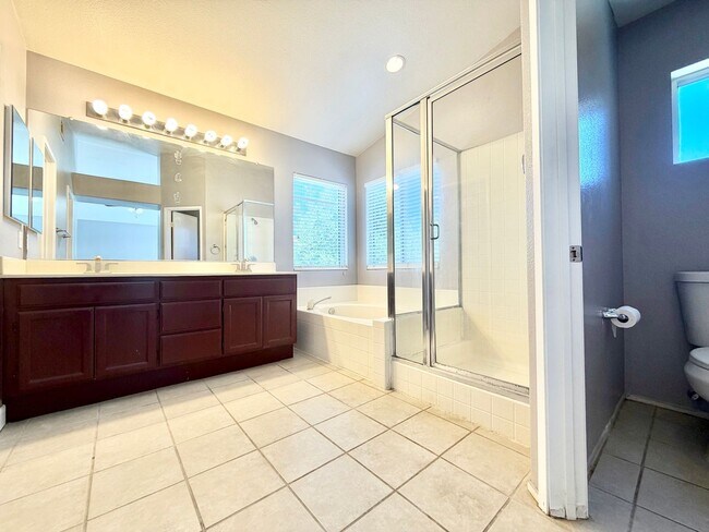 Building Photo - Spacious 5 Bedroom Home with 3 Car Garage & Primary Suite Balcony