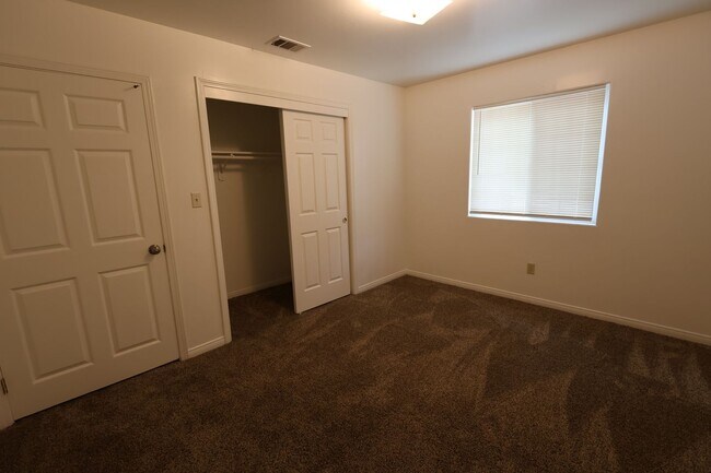 Building Photo - Spacious 3-Bedroom Duplex with Private Patio and Prime Location