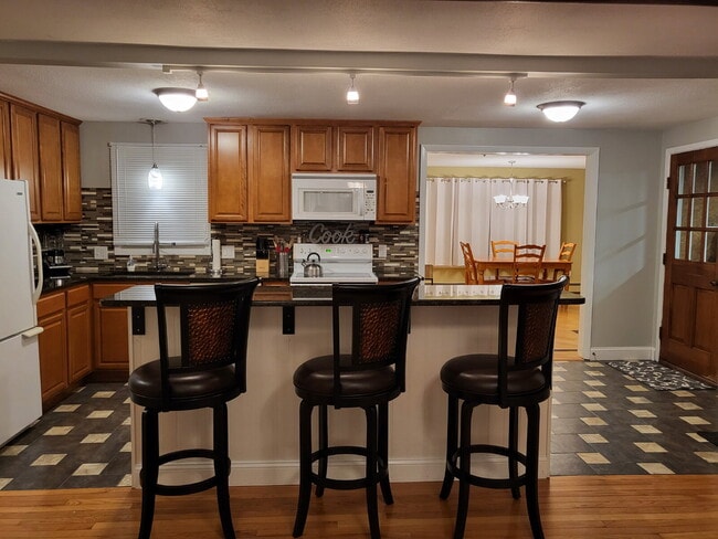 Building Photo - Fully Furnished Pearl Street Retreat in th...