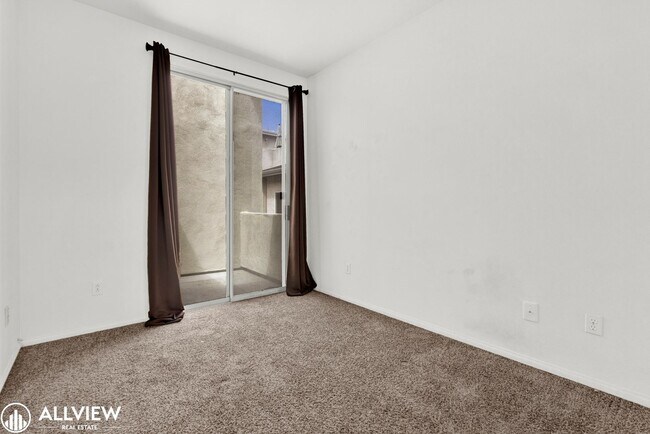 Building Photo - Spacious Coastal Condo with Rooftop Ocean ...