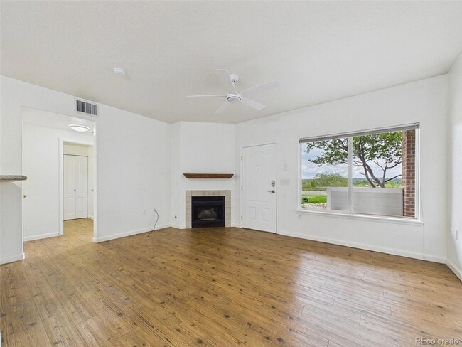 Building Photo - 10239 W 55th Dr