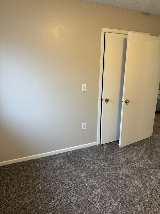 Building Photo - Whispering Pines