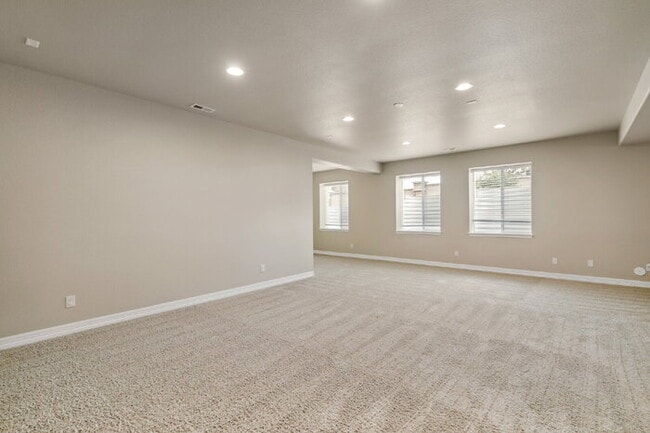 Building Photo - Stylish Cordera Ranch with Finished Basement, Gourmet Kitchen, and Ideal D20 Location