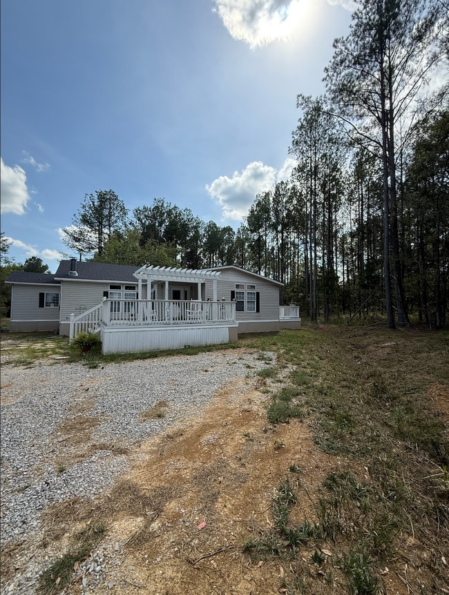 Building Photo - Updated Country Home – 3 Bed, 2 Bath – 2,500 Sq Ft with Fenced Yard & Spacious Porches