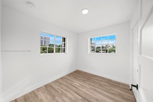 Building Photo - 7520 Hispanola Ave