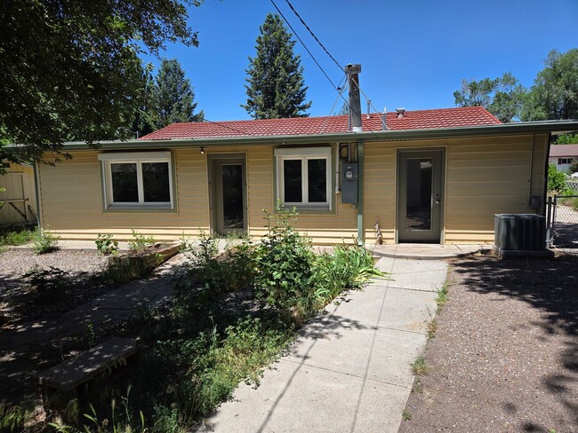 Building Photo - COMING IN JULY! Spacious 4-Bedroom Home in...