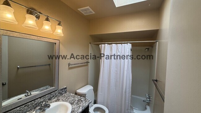 Building Photo - Three bedroom townhome with community pool