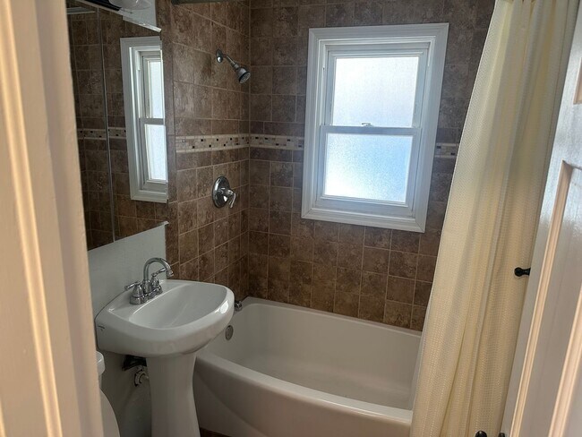 Building Photo - Sunnyside Charmer with Garage & Private Yard