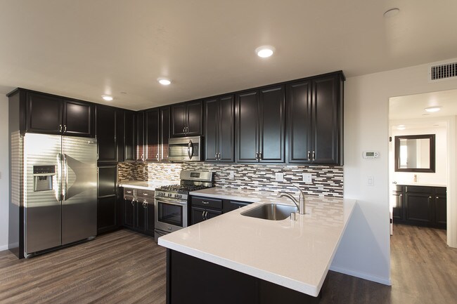 Building Photo - Must See 4 BR Townhome Blocks to USD with ...