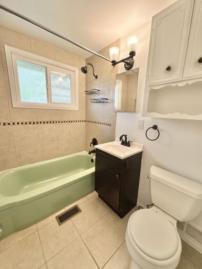 Building Photo - Immaculate, Updated, & Bright Home in West...