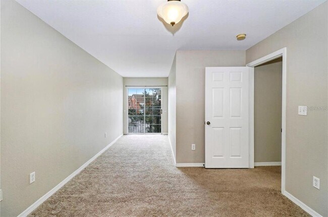 Building Photo - 9506 Lake Chase Island Way
