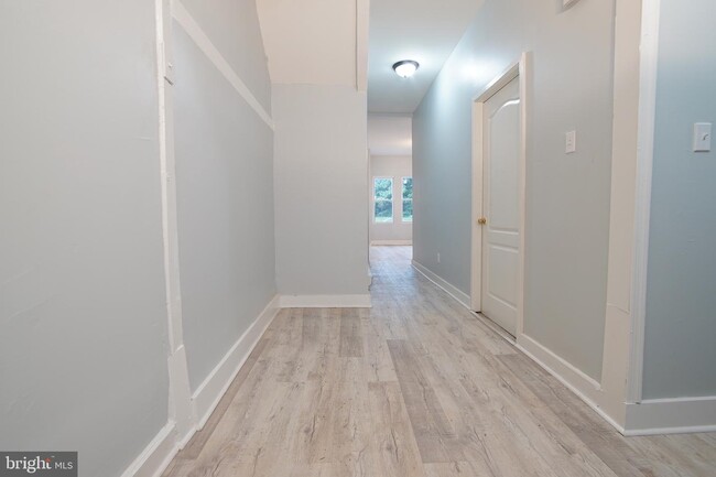 Building Photo - 7022 Woodland Ave