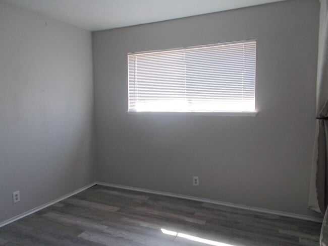 Building Photo - Spacious 4-Bedroom, 3-Bathroom Home with Open Floor Plan & Large Backyard – Prime Location!