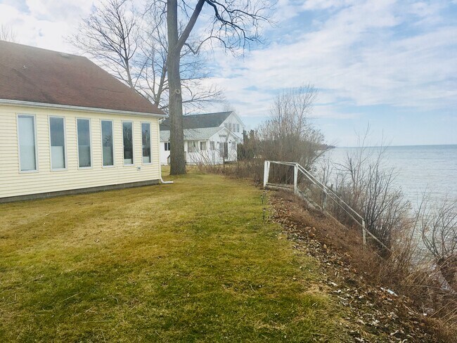 The house sits high on a cliff - 3061 Maple Ave