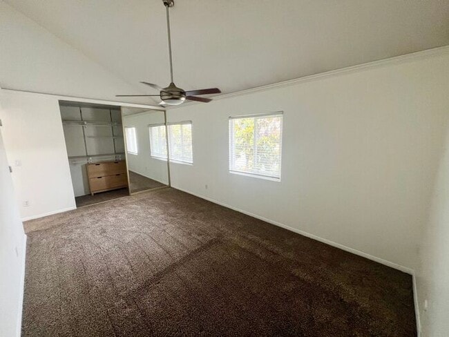 Building Photo - Stunning 4BR Townhome with Hardwood Floors, Private Patio, Community Pool & 2-Car Garage!
