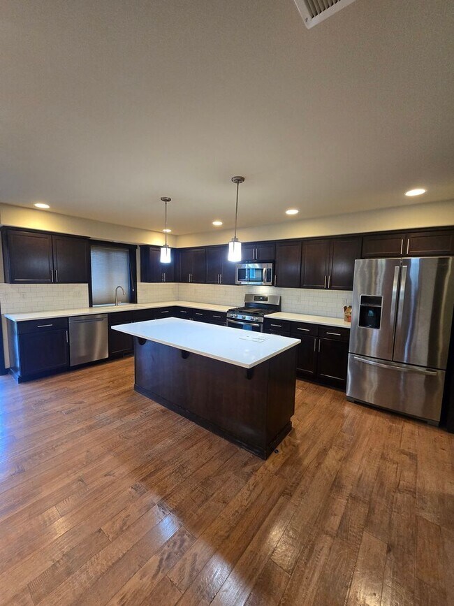 Building Photo - Welcome to this beautiful 4-bedroom, 2.5-b...