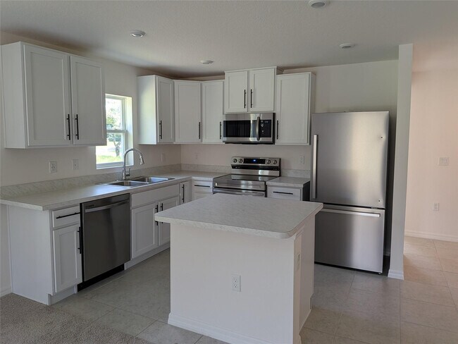 Building Photo - 9065 107th Ct