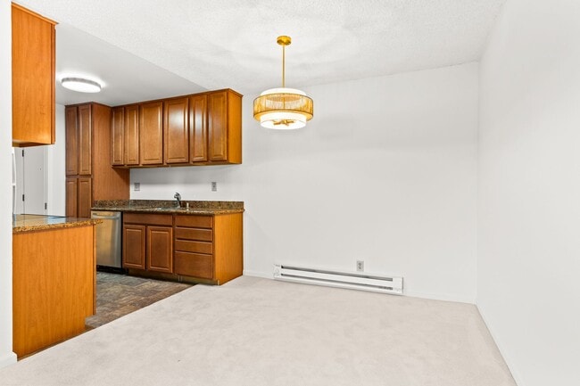 Building Photo - Modern 2-Bedroom Condo with Pool and Koi Pond Views