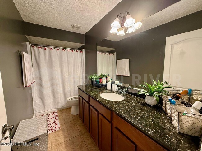 Building Photo - 7541 Allspice Cir N