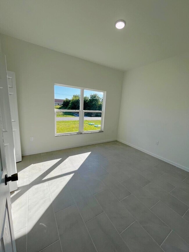 Building Photo - BRAND NEW 2/2/1- SW LEHIGH ACRES