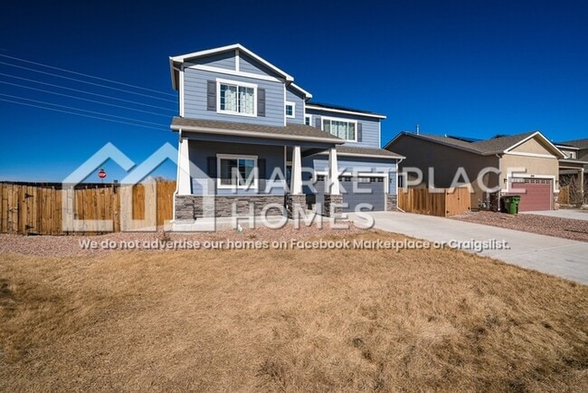 Building Photo - 9799 Desert Lily Cir