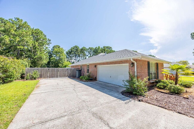 Building Photo - "Coastal Elegance Awaits: Spacious 4-Bed Oasis with $400.00 Off First Full Months Rent!"
