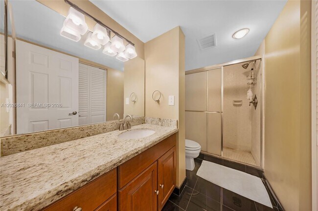Building Photo - 6075 N Sabal Palm Blvd