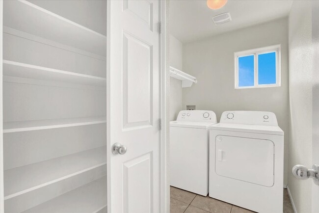 Building Photo - 6909 Graceful Cloud Ave