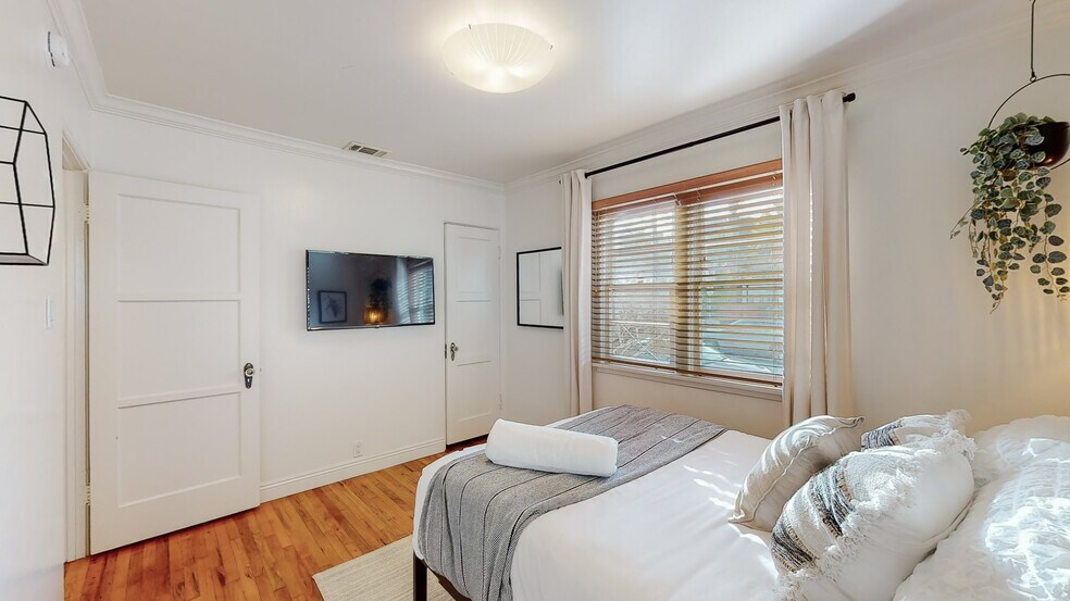 Bedroom 1 TV - 904 Victoria Ave