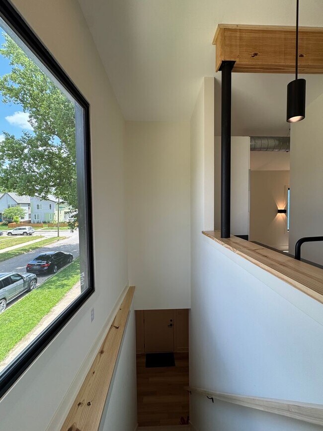 Building Photo - Vaulted Ceilings & Hardwood Floors in This Charming Indianapolis L