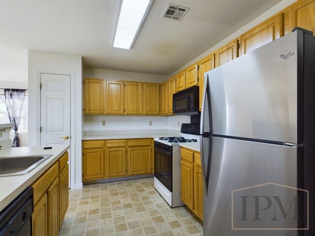 Building Photo - First Month Rent Free! - 3 Bedroom Home in...