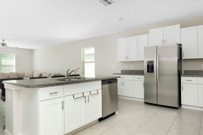 Building Photo - Spacious 5-Bed Touchstone Home – Primary Suite Downstairs, 2-Car Garage