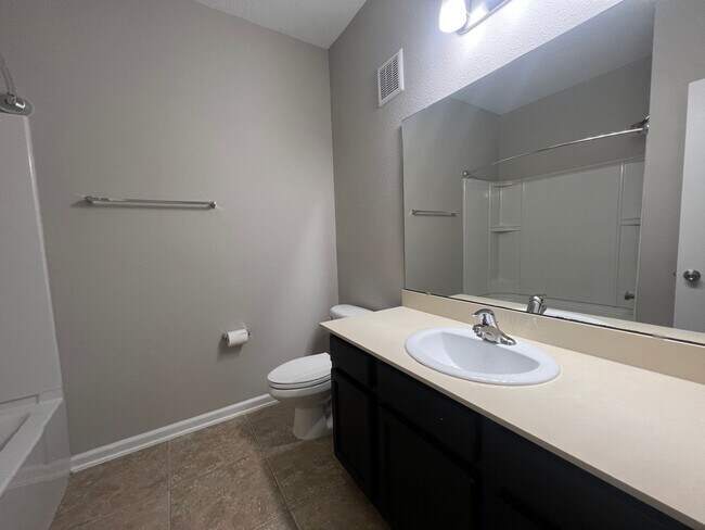 Building Photo - Stylish 3 Bedroom, 2 bath Condo with Woode...