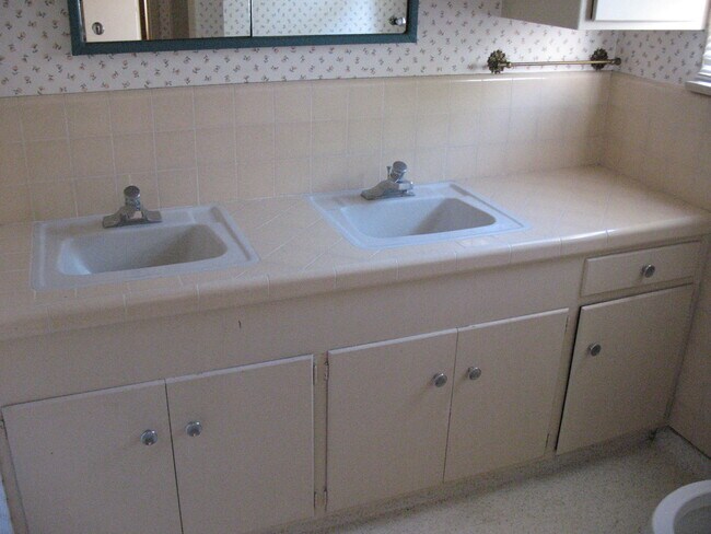 2nd bathroom - twin sinks and shower - 3121 W Wyoming Ave