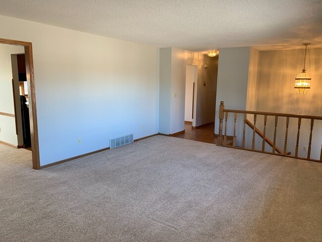 Building Photo - ~ FALL SPECIALS GALORE ~  Elegant 4-Bedroo...