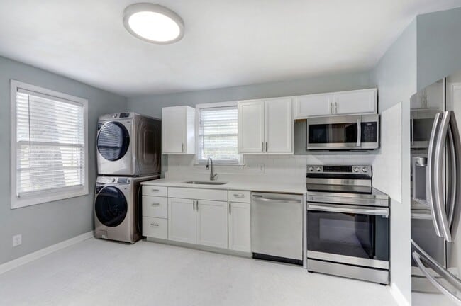 Building Photo - Renovated Three Bedroom House with large yard