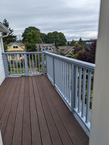 Newly painted deck railing - 4049 Latona Avenue NE